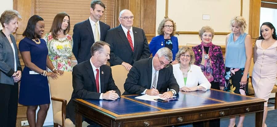 Governor signs Messmer Lampert backed bill requiring schools