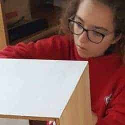 Quinton’s House CAC receives new home, new equipment, and gives kids new start in life Hailey Noether helps paint shelves at the new Quinton's House