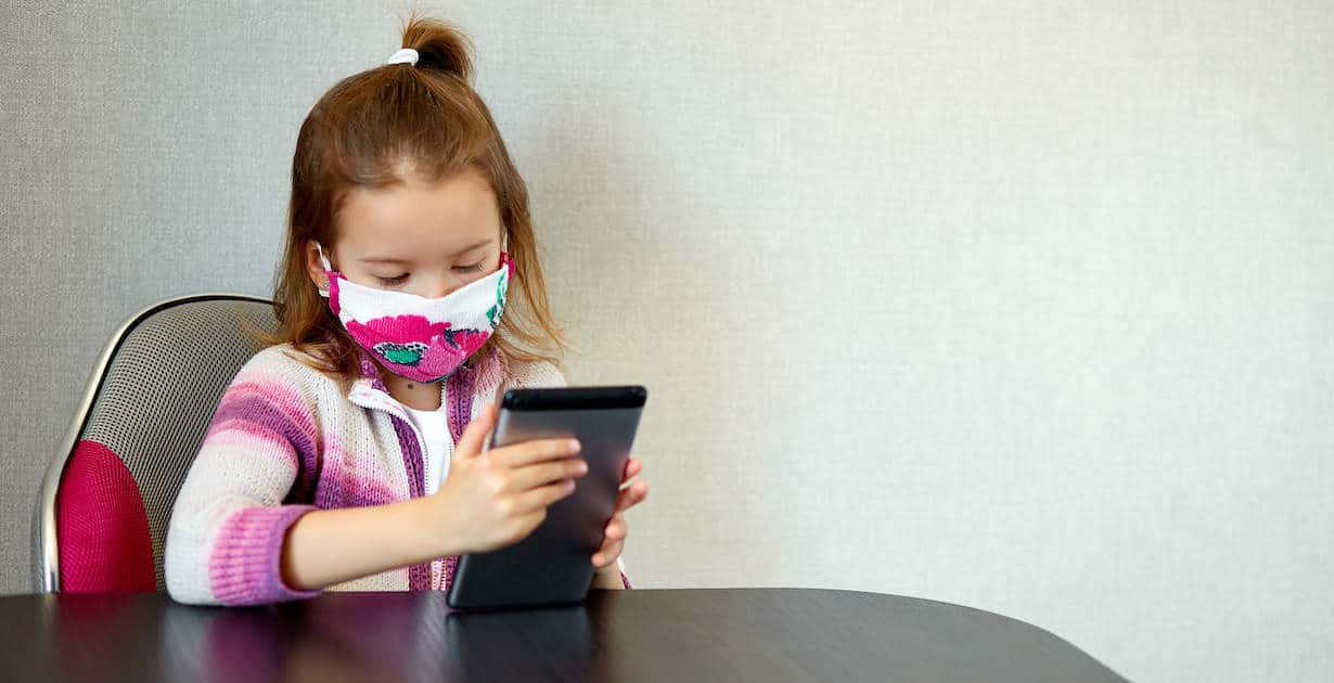 Girl wearing PPE mask