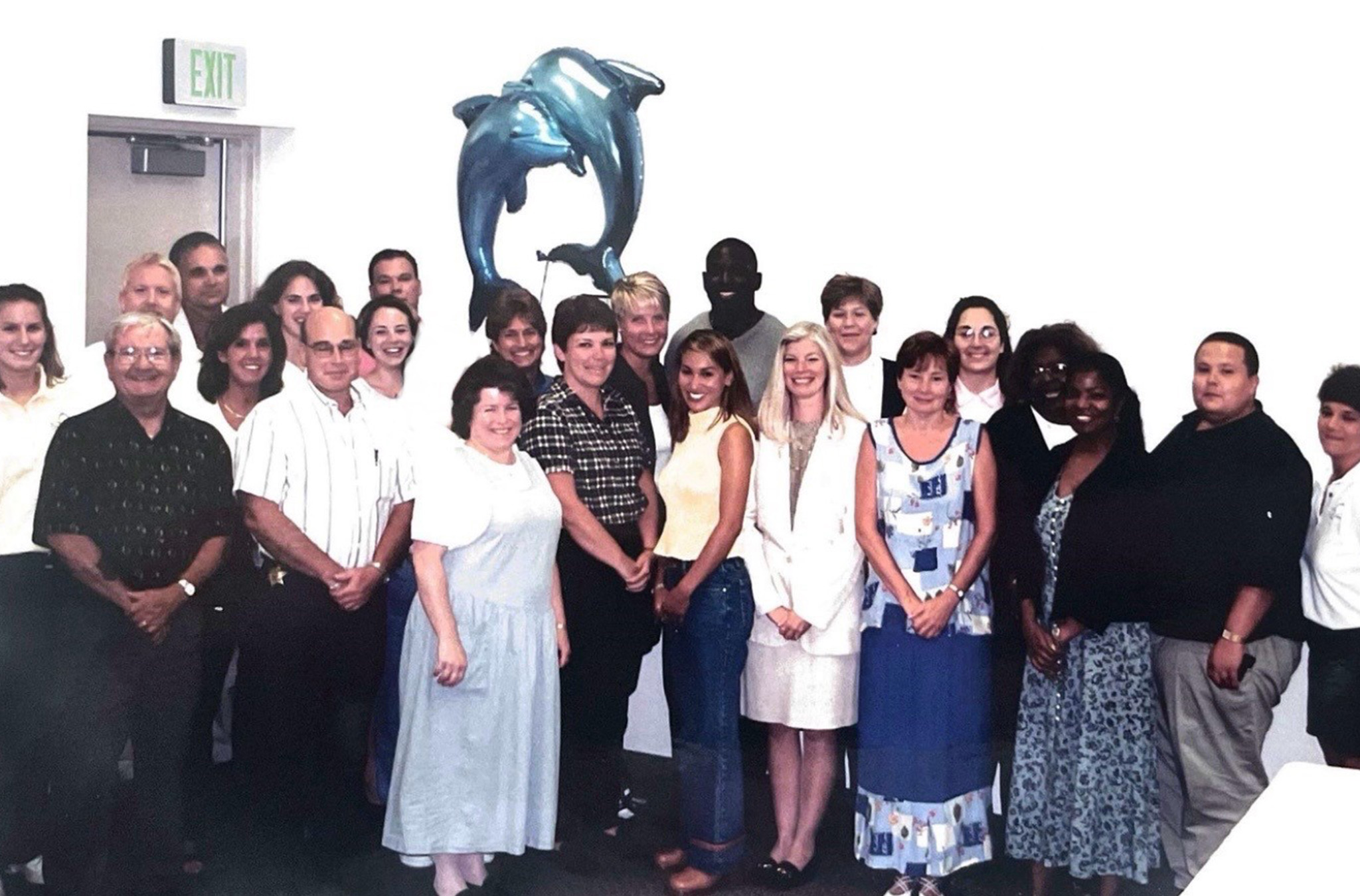 Pat Smallwood poses with a group of colleagues